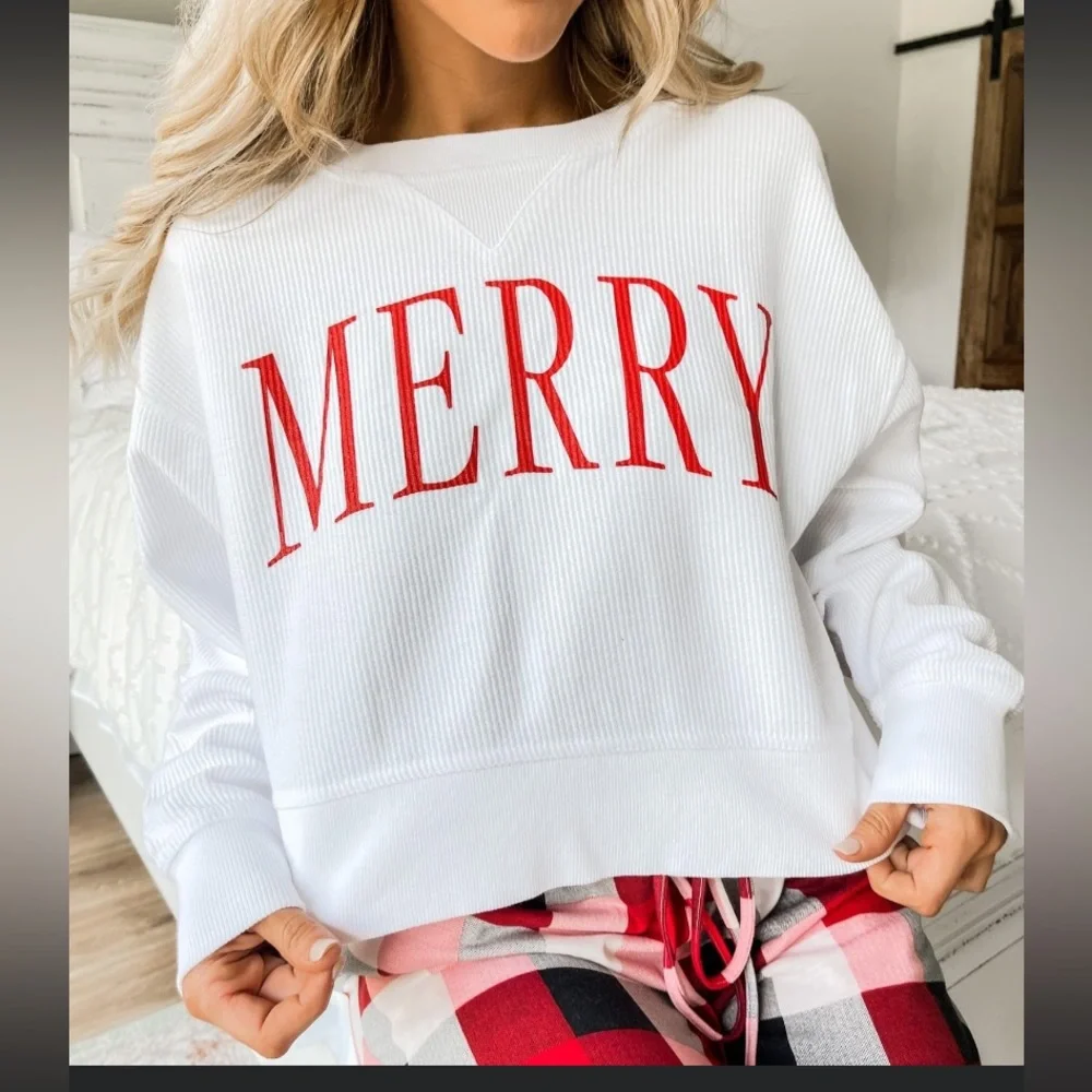{Pink Lily} MERRY VARSITY WHITE CROPPED CORDED GRAPHIC SWEATSHIRT - Women’s - Picture 1 of 6